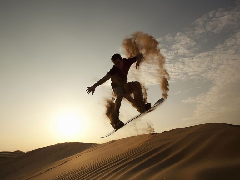 dailysoccerblog | Trying Sandboarding on the Red Desert Dunes