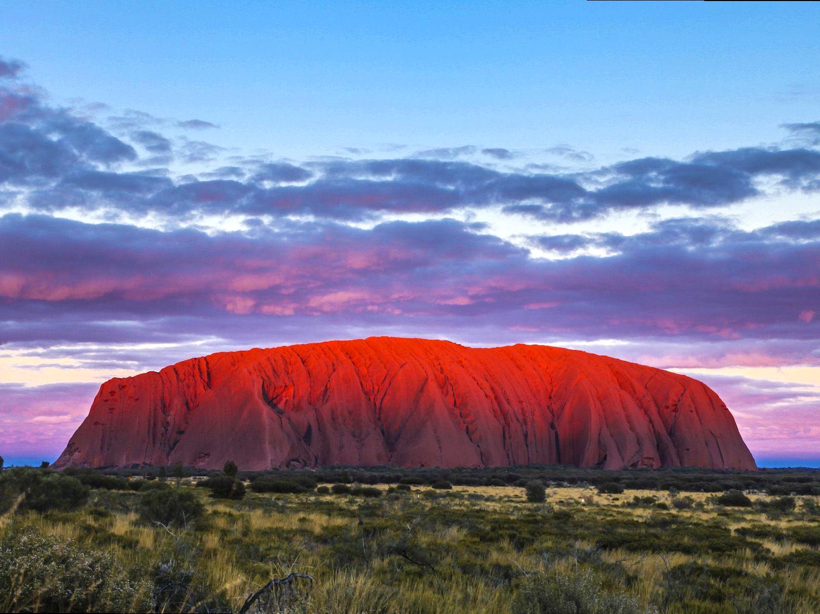 dailysoccerblog | Exploring the Rock Formations and Caves of Uluru Up Close